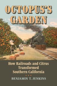 Cover image of the book "Octopus's Garden" featuring a postcard of a steam train traveling through a orange groves with workers picking fruit.  